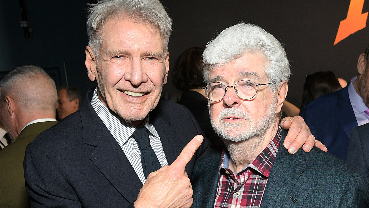 (L-R) Harrison Ford and George Lucas attend the Indiana Jones and the Dial of Destiny U.S. Premiere at the Dolby Theatre in Hollywood, California on June 14, 2023.