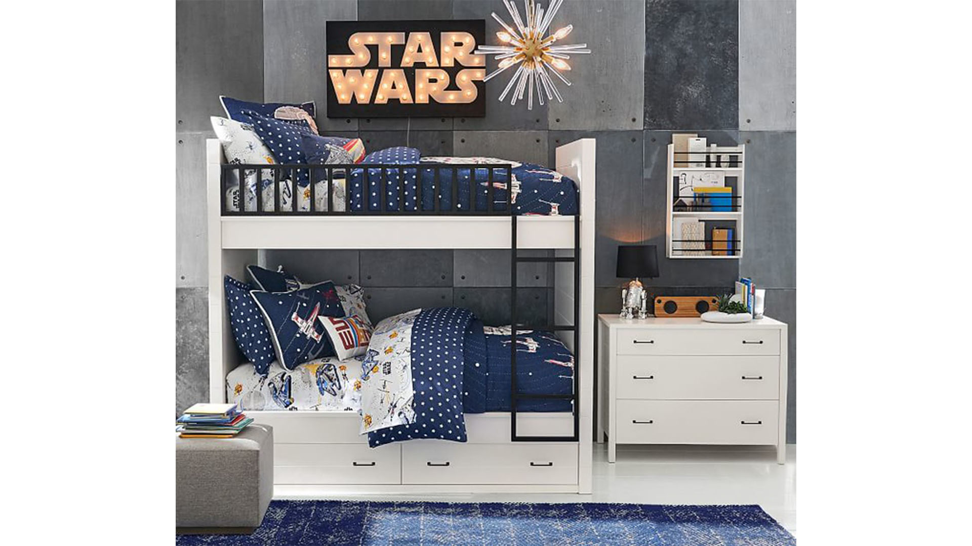 A bedroom decorated with Star Wars items, including a neon 
