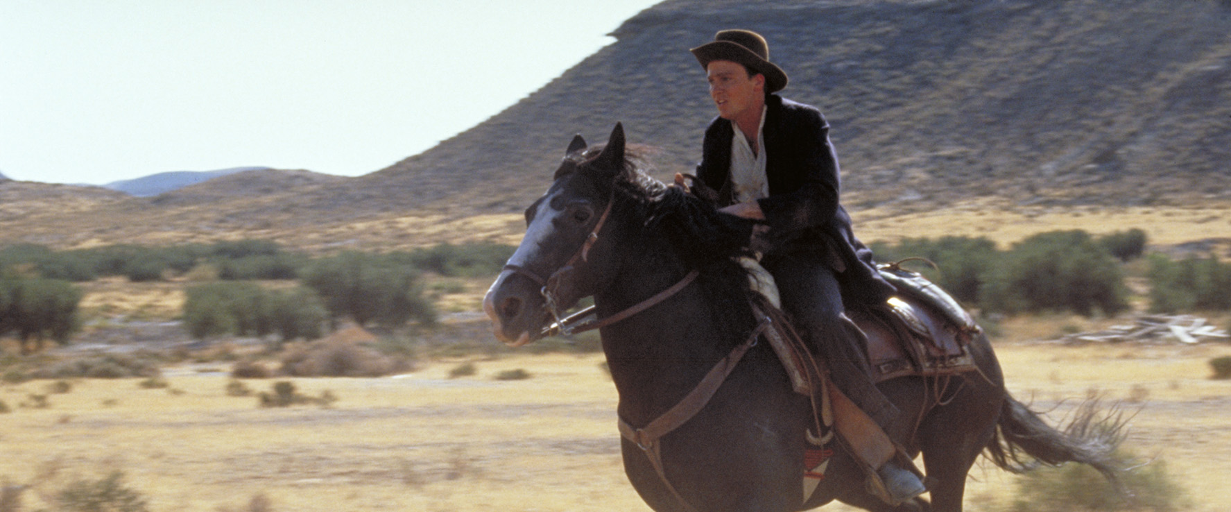 Young Indy on horseback