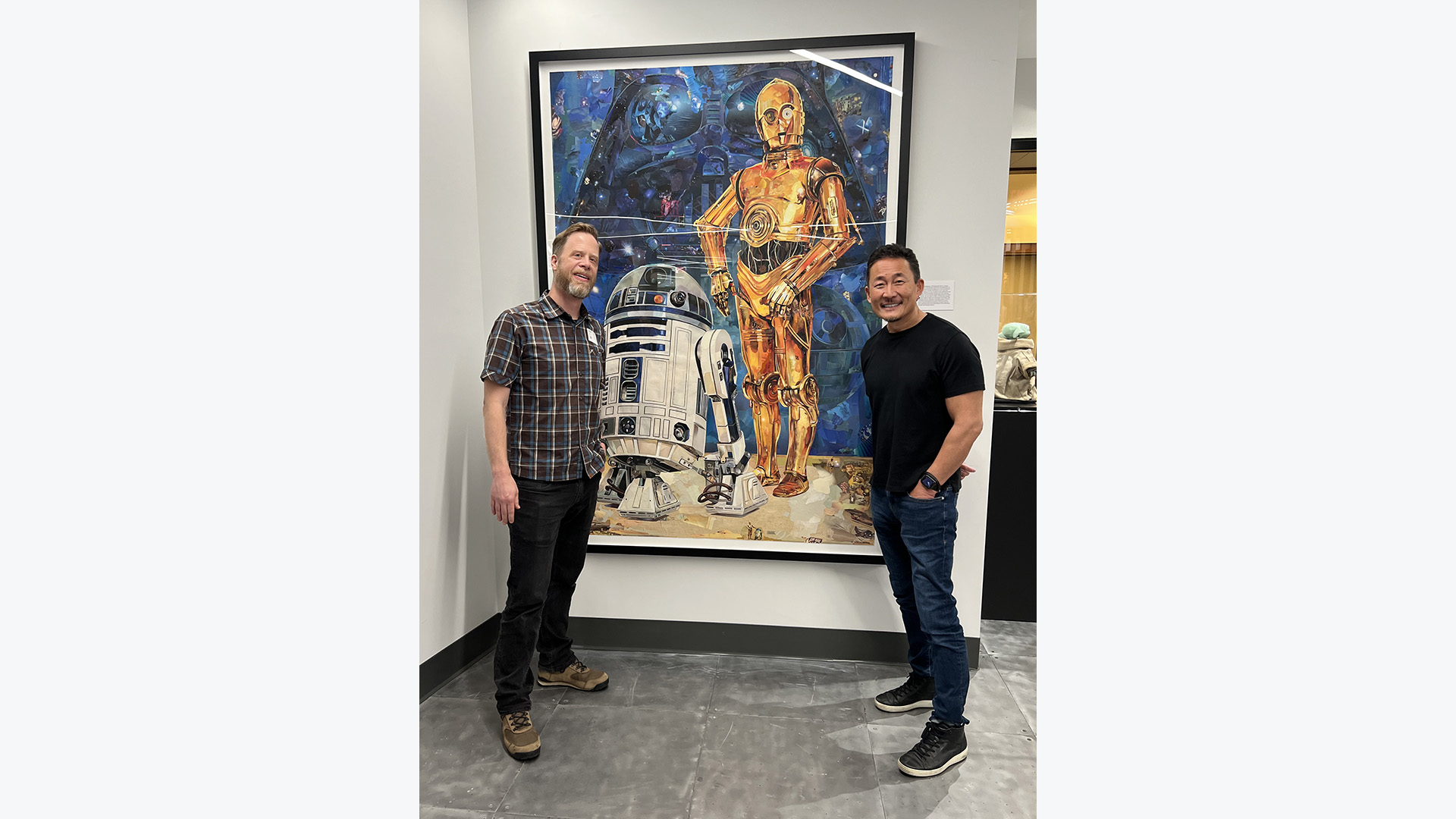 Nathan Stromberg and artist Doug Chiang with Stromberg's Star Wars collage.