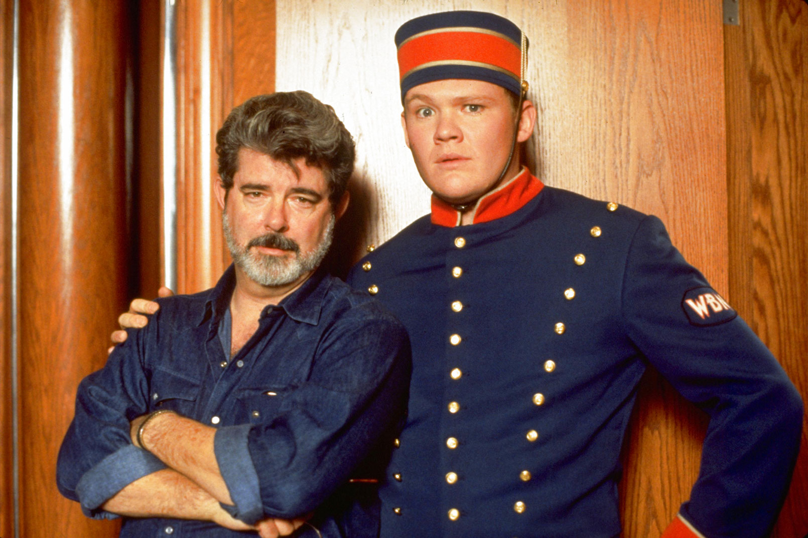 George Lucas and actor Scott Michael Campbell as Billy on the set of Radioland Murders.