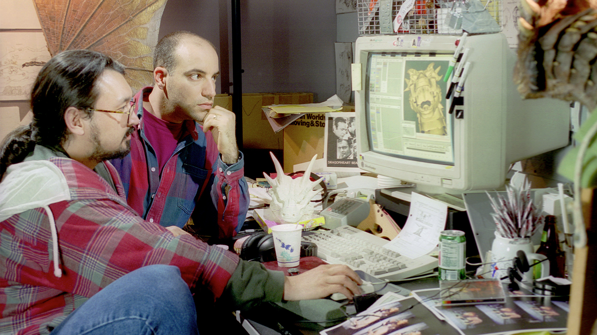 James Strauss and Paul Giacoppo from ILM work at a computer.
