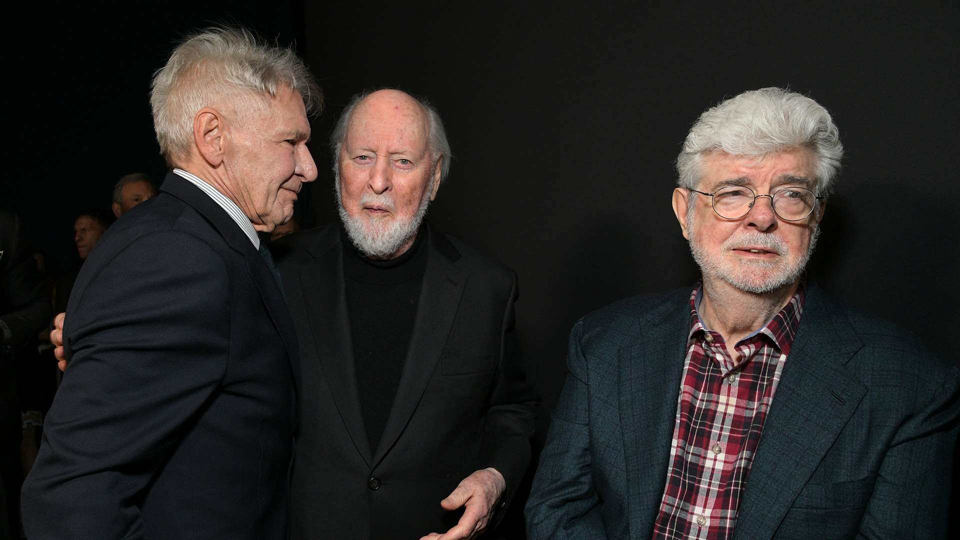 Harrison Ford, George Lucas, and John Williams at the U.S. premiere red carpet