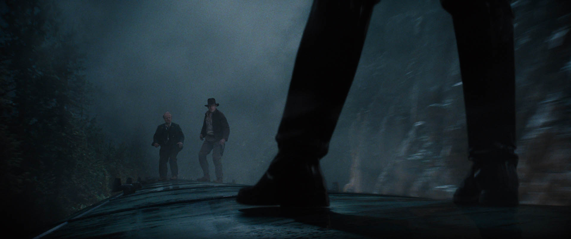 (L-R): Basil (Toby Jones), Indiana Jones (Harrison Ford) and Doctor Jürgen Voller (Mads Mikkelsen) in Lucasfilm's IJ5.