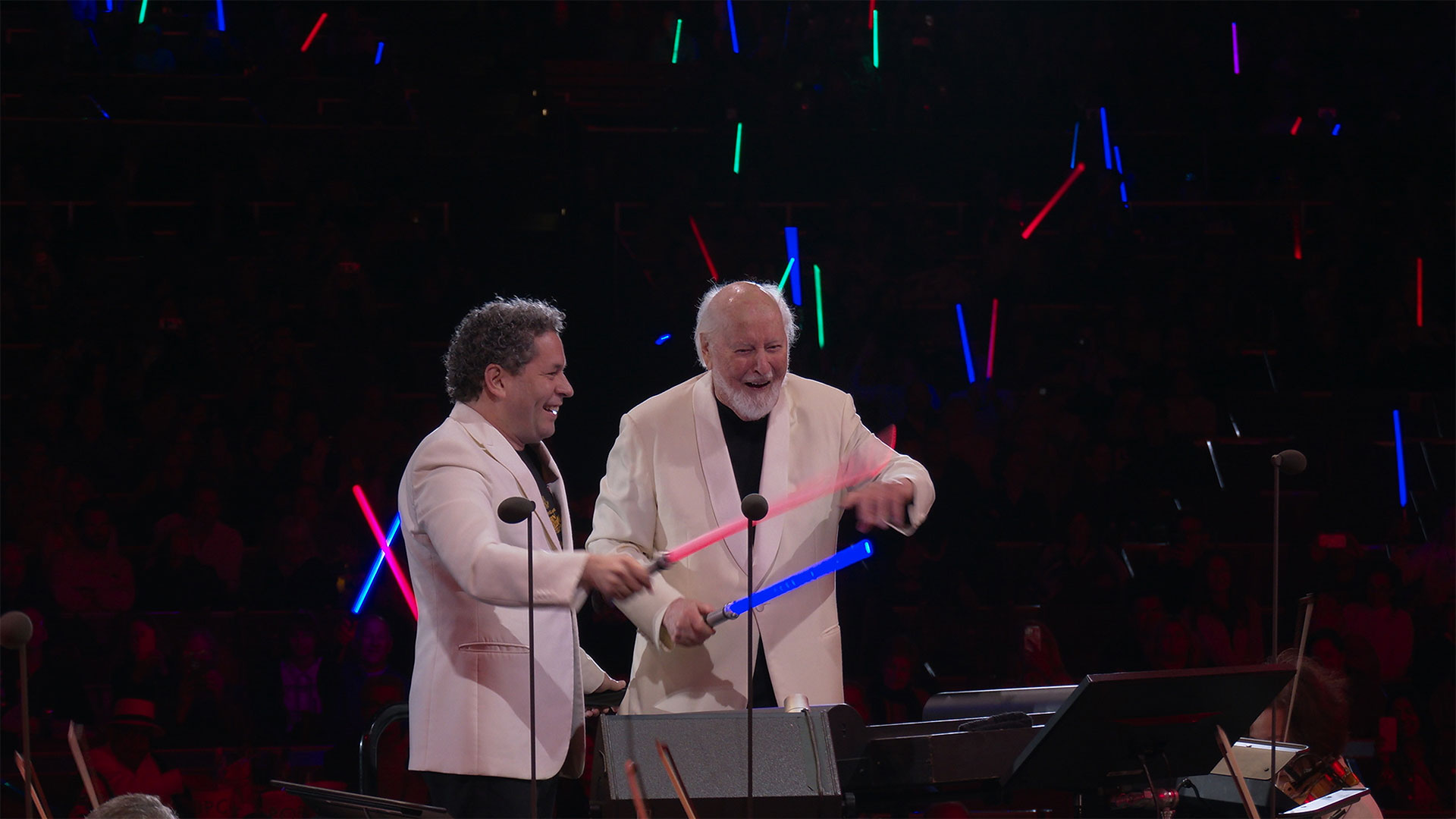 Williams and conductor Gustavo Dudamel onstage at the Hollywood Bowl.