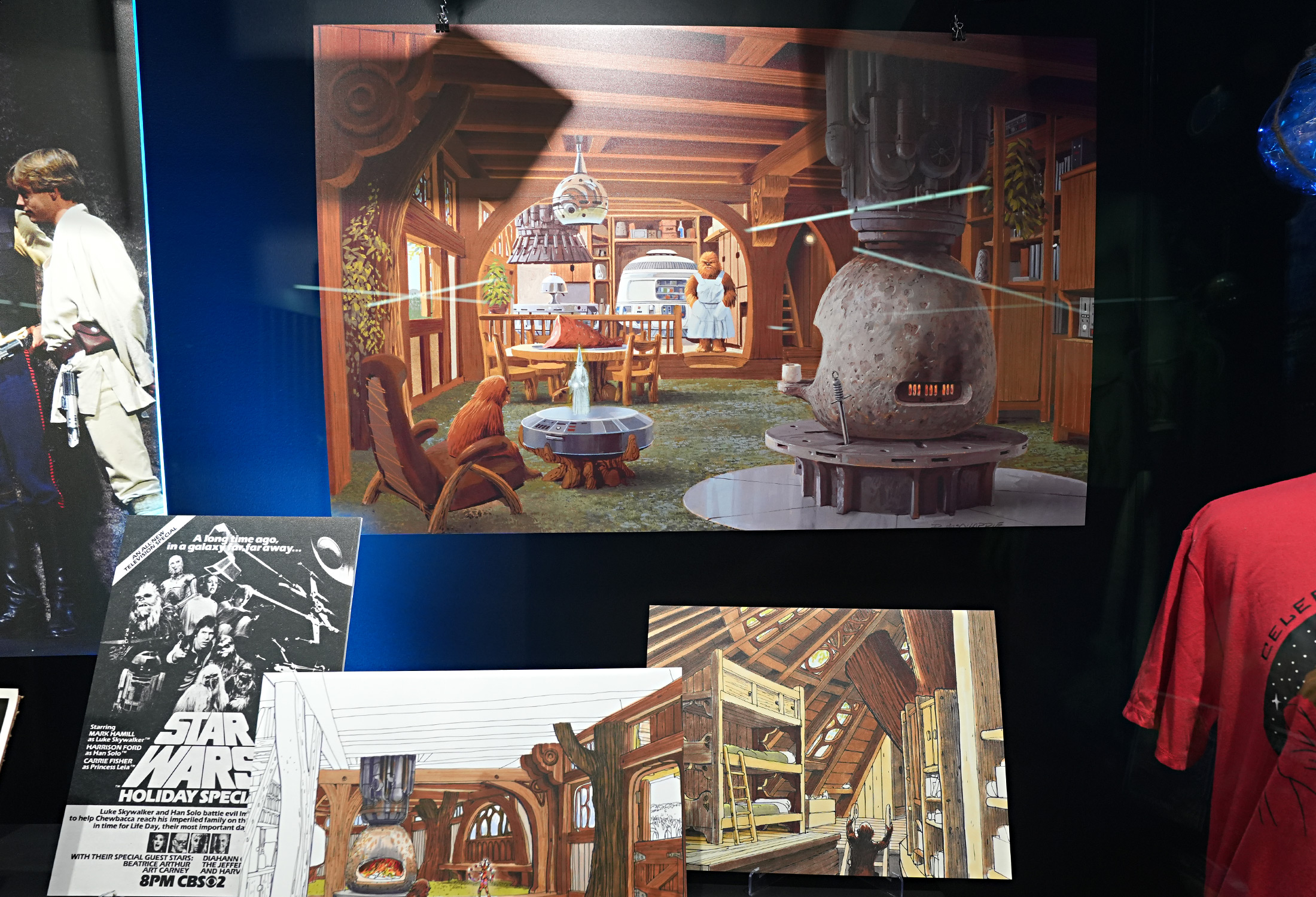 Several enlargements of artist Ralph McQuarrie’s preliminary and final designs for the Holiday Special’s Wookiee household are on display, including the main living space, Lumpy’s bedroom, and the kitchen, which is said to have been one of the artist’s personal favorites.