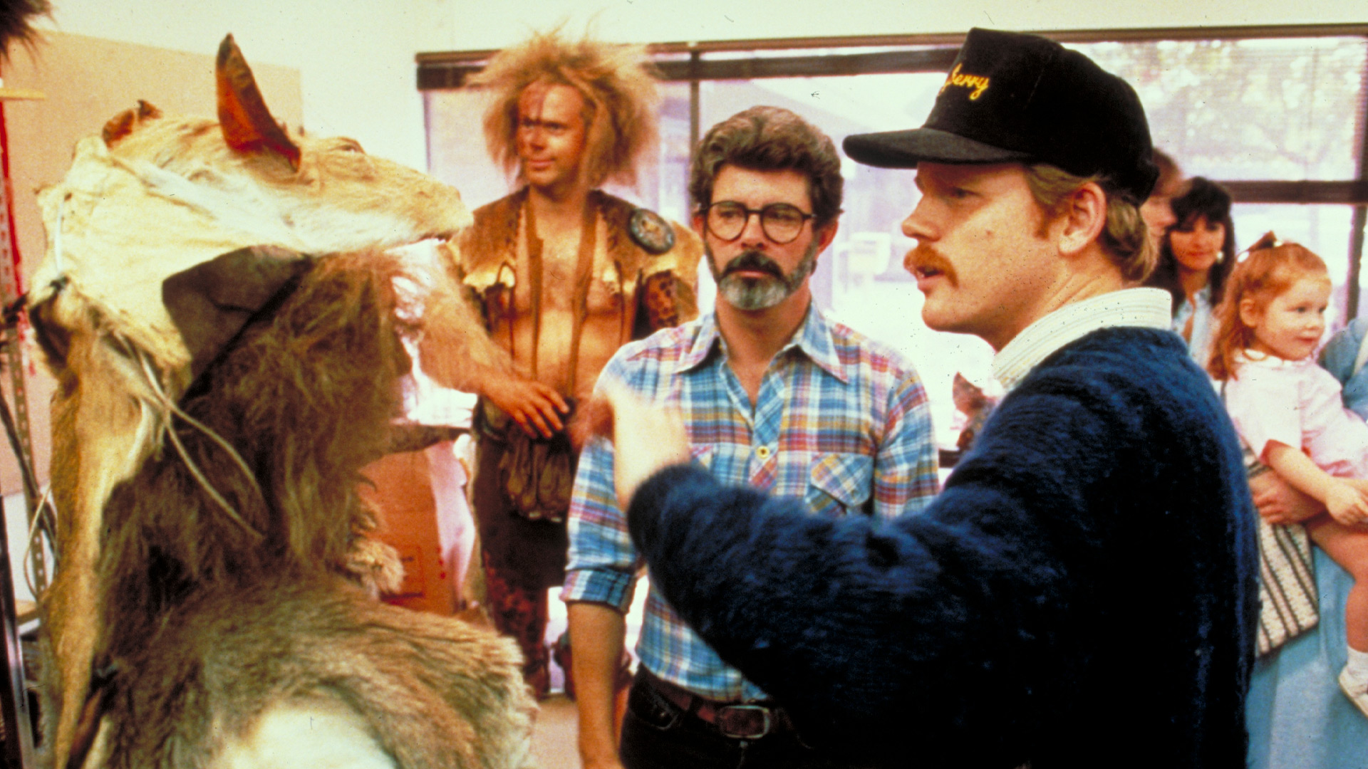 Ron Howard and George Lucas looking at brownie costumes