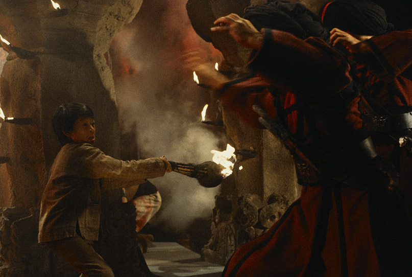 Short Round fights off a Thugee in Indiana Jones and the Temple of Doom.