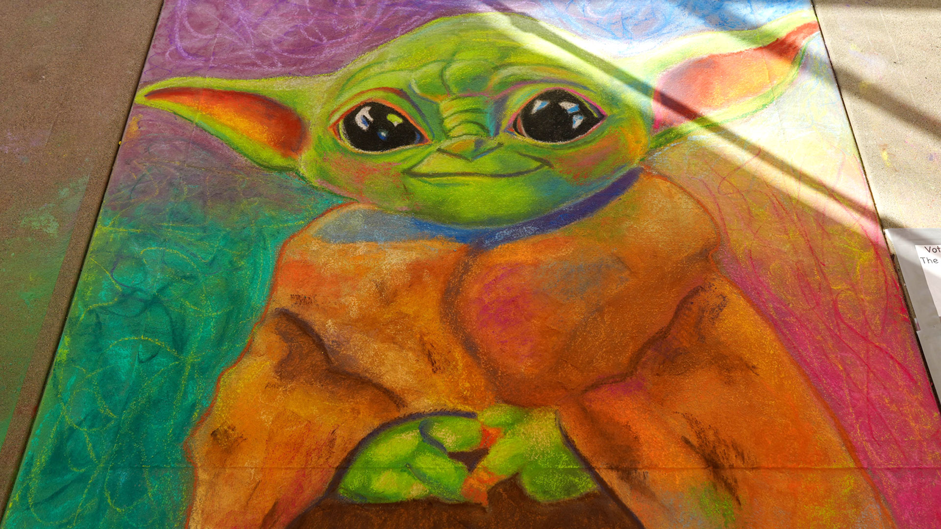 Chalk art of Grogu from Lucasfilm’s Sidewalk Chalk Art Festival 2024.