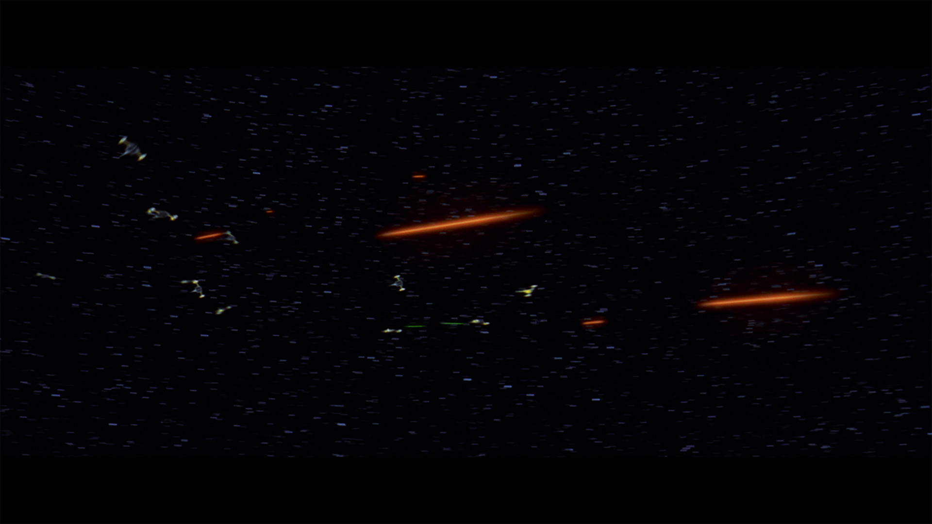 Naboo starfighters and Trade Federation starfighters dogfight in space in Star Wars: The Phantom Menace.