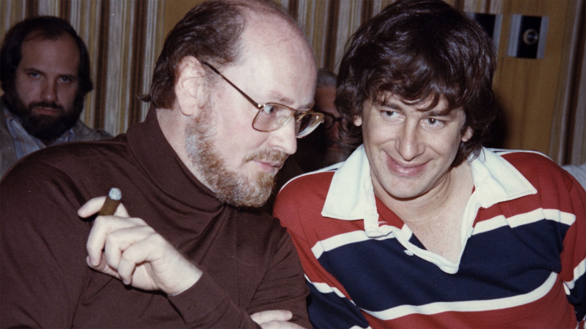 Composer John Williams and director Steven Spielberg confer in the 1970s.